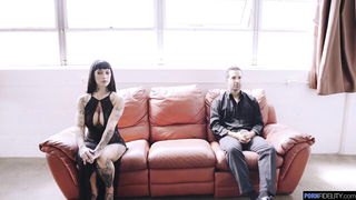 Pair of performers in motion on a wide bed