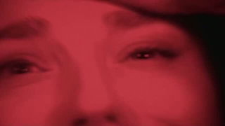 Close frame of an explicit scene in sharp indoor light
