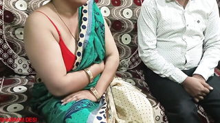 Couple on a patterned bedspread in an explicit scene