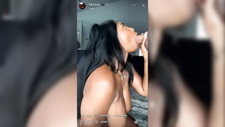 Explicit doggy style scene on a wide bed