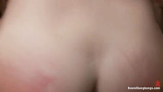 Explicit doggy style scene on a wide bed