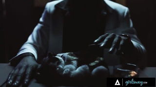 Close frame of an explicit scene in sharp indoor light