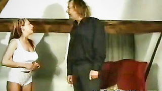 Pair of performers in motion on a wide bed
