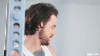 Explicit massage scene in a softly lit room