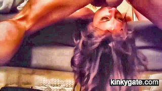 Explicit massage scene in a softly lit room