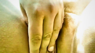 Close frame of an explicit scene in sharp indoor light