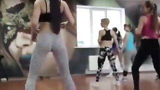 Pair of performers in motion on a wide bed