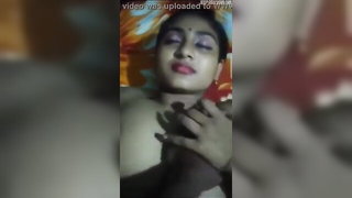 Explicit doggy style scene on a wide bed