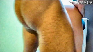 Explicit doggy style scene on a wide bed