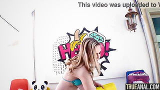 Explicit massage scene in a softly lit room