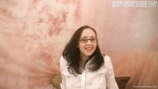 Explicit massage scene in a softly lit room