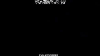 Amateur couple on a living room sofa in explicit scene