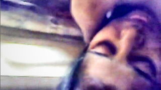 Close frame of an explicit scene in sharp indoor light
