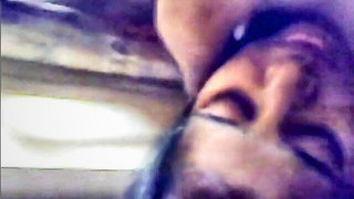Close frame of an explicit scene in sharp indoor light
