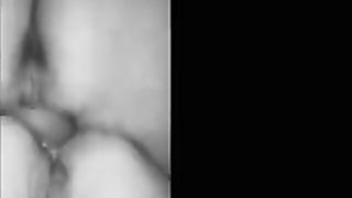 Explicit massage scene in a softly lit room