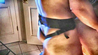 Explicit massage scene in a softly lit room