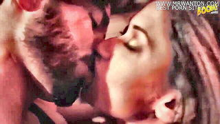 Explicit doggy style scene on a wide bed