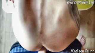 Explicit massage scene in a softly lit room