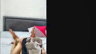 Explicit doggy style scene on a wide bed