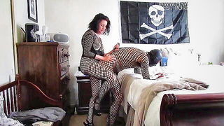 Pair of performers in motion on a wide bed