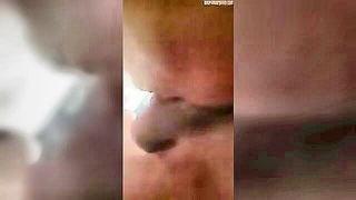 Close frame of an explicit scene in sharp indoor light