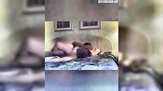 Pair of performers in motion on a wide bed