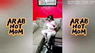 Explicit doggy style scene on a wide bed