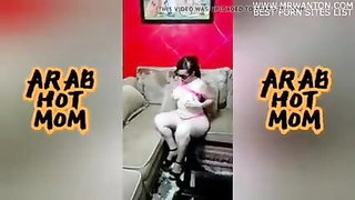 Explicit doggy style scene on a wide bed