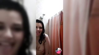 Couple mid-scene in a dim bedroom