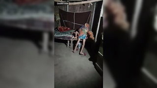 Explicit doggy style scene on a wide bed