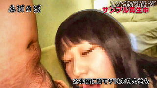 Explicit massage scene in a softly lit room