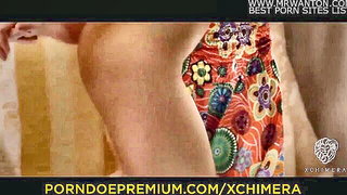 Couple on a patterned bedspread in an explicit scene