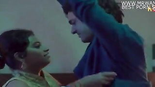 Explicit massage scene in a softly lit room