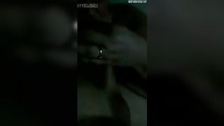 Explicit massage scene in a softly lit room