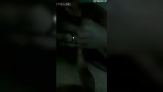 Explicit massage scene in a softly lit room