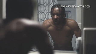 Explicit massage scene in a softly lit room