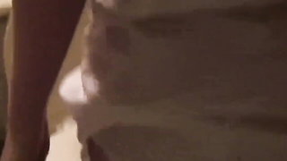 Close frame of an explicit scene in sharp indoor light