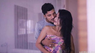 Explicit massage scene in a softly lit room