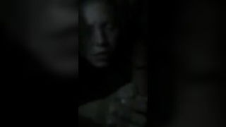Explicit massage scene in a softly lit room