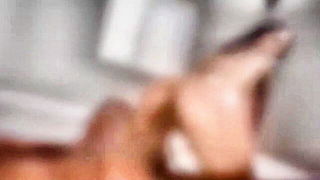 Close frame of an explicit scene in sharp indoor light
