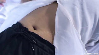 Close frame of an explicit scene in sharp indoor light