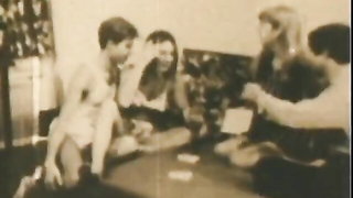 Couple mid-scene in a dim bedroom