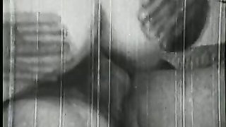 Pair of performers in motion on a wide bed