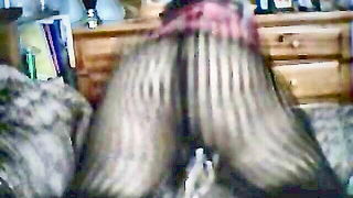 Explicit massage scene in a softly lit room