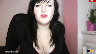 Solo performer with a toy on rumpled bedsheets