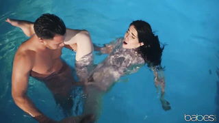 Explicit doggy style scene on a wide bed