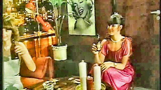 Studio set with performers in an explicit scene under bright lights
