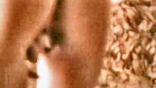 Close frame of an explicit scene in sharp indoor light