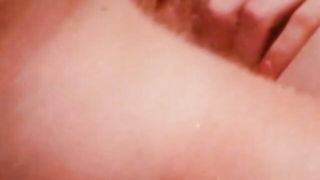 Close frame of an explicit scene in sharp indoor light