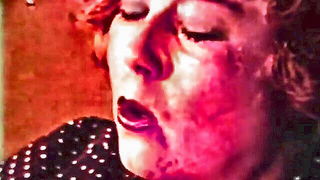 Close frame of an explicit scene in sharp indoor light